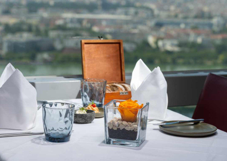 What does the “Cover Charge” at the Turm Restaurant mean?